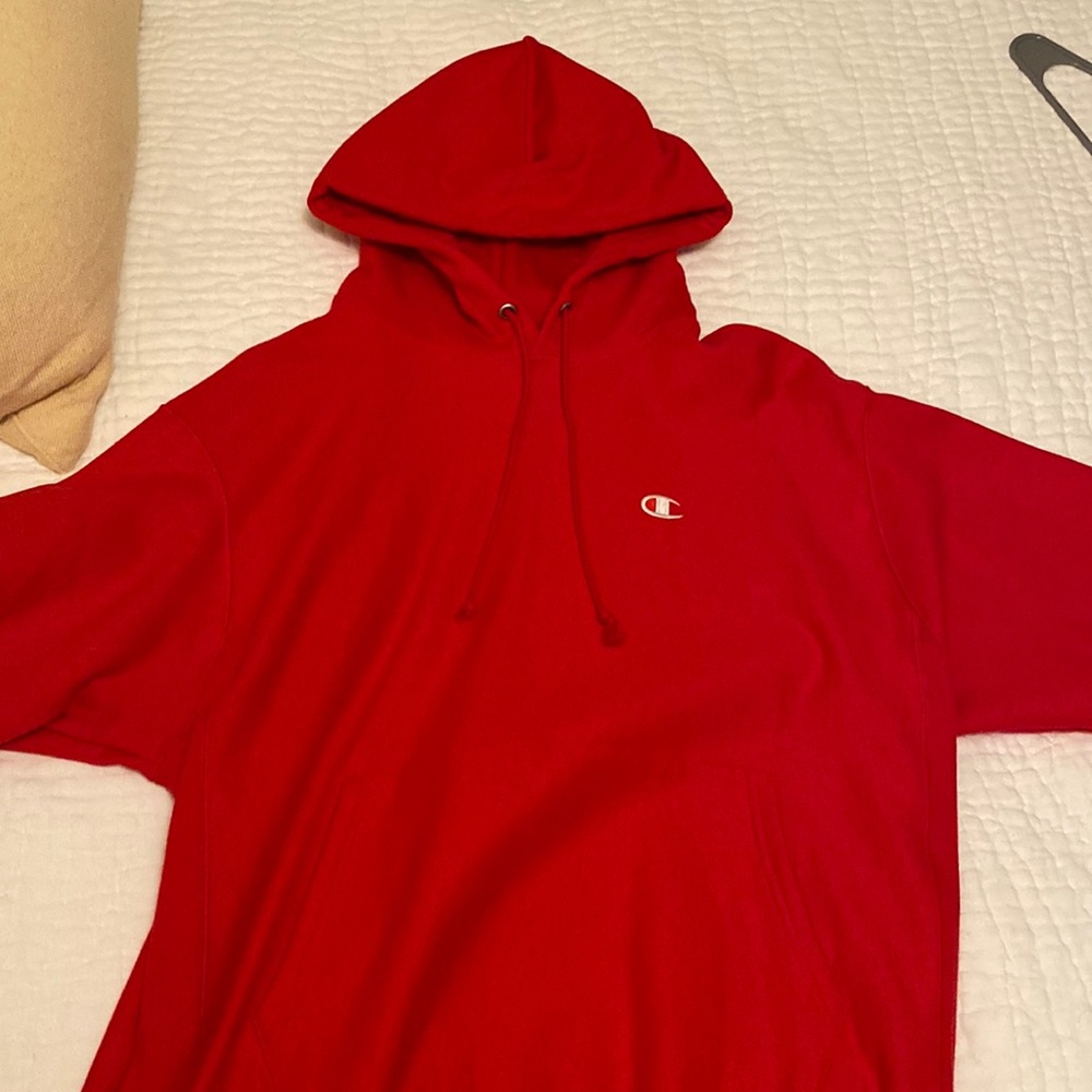 Red Champions hoodie, size large-perfect condition, never worn.